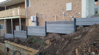Retaining Wall with Powdercoated steel posts concrete sleepers in Lilydale